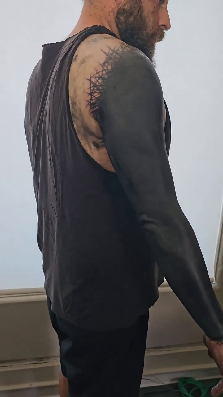 Full sleeve blackwork tattoo by Kevin Ligabue