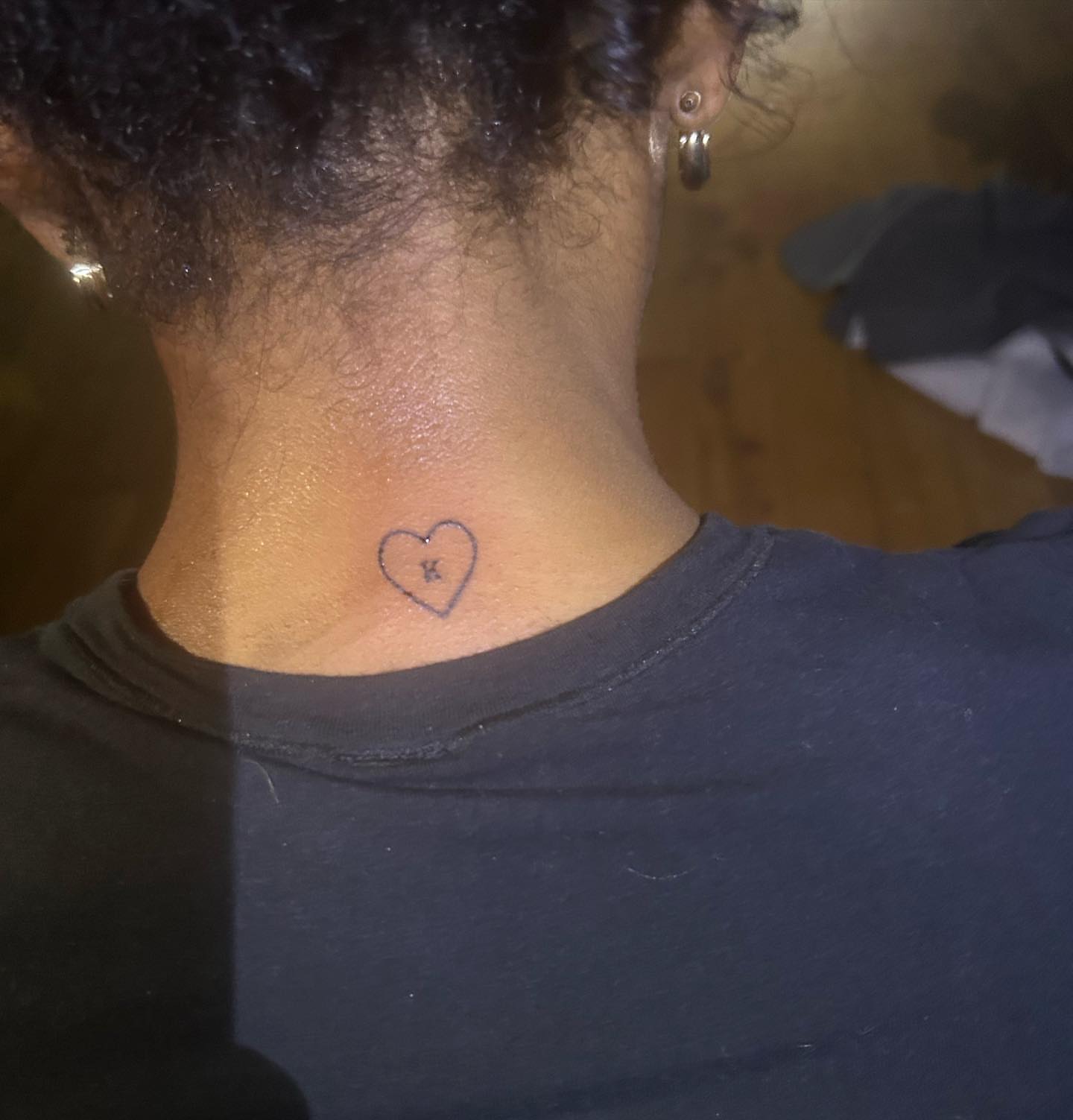 Heart with letter K black and grey tattoo on the neck by ๐ฆ