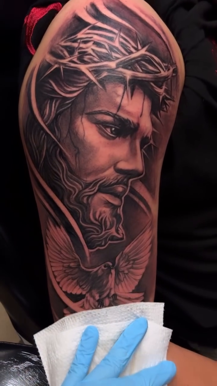 Jesus Christ with dove realism tattoo by Anthony Coleman, Midland, Texas