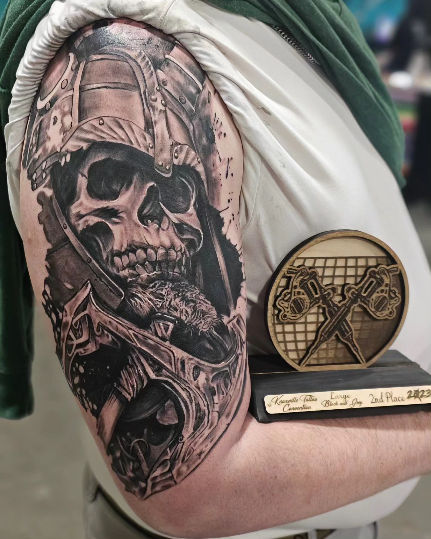Warrior skull realism tattoo on the shoulder by Christian Mulvey