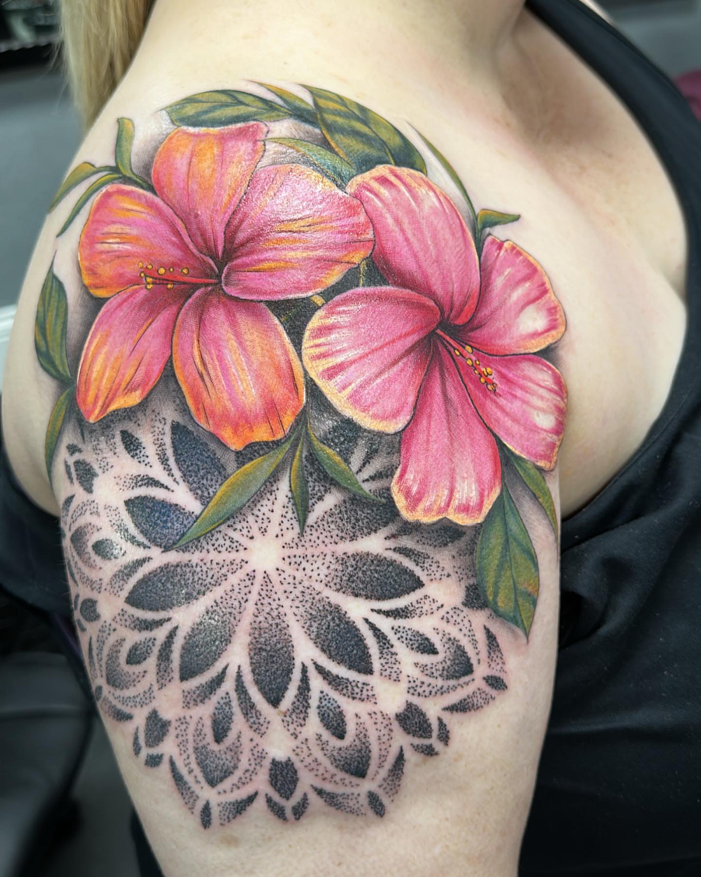Hibiscus flowers dotwork tattoo on the shoulder by Pablo Venegas