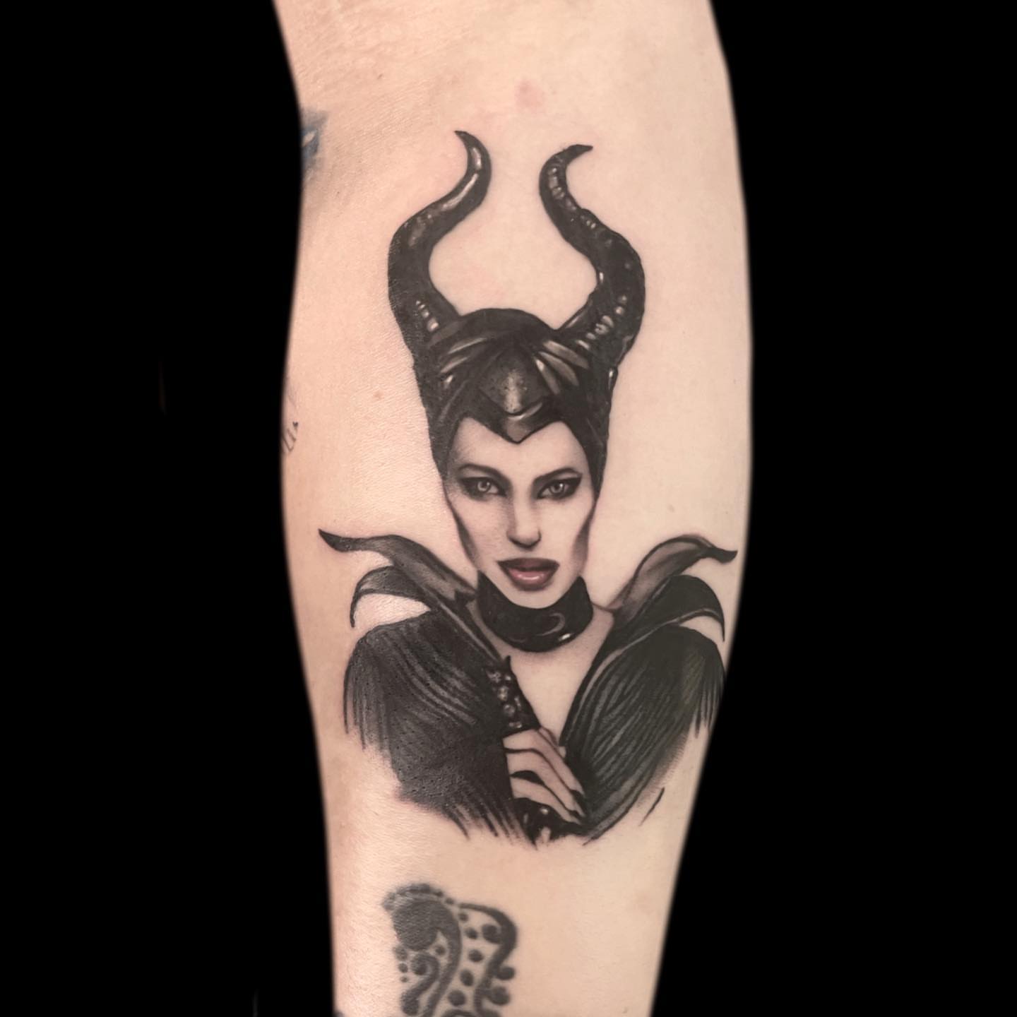 Maleficent dark realism tattoo on the forearm by Jen Bean, Richmond, Virginia