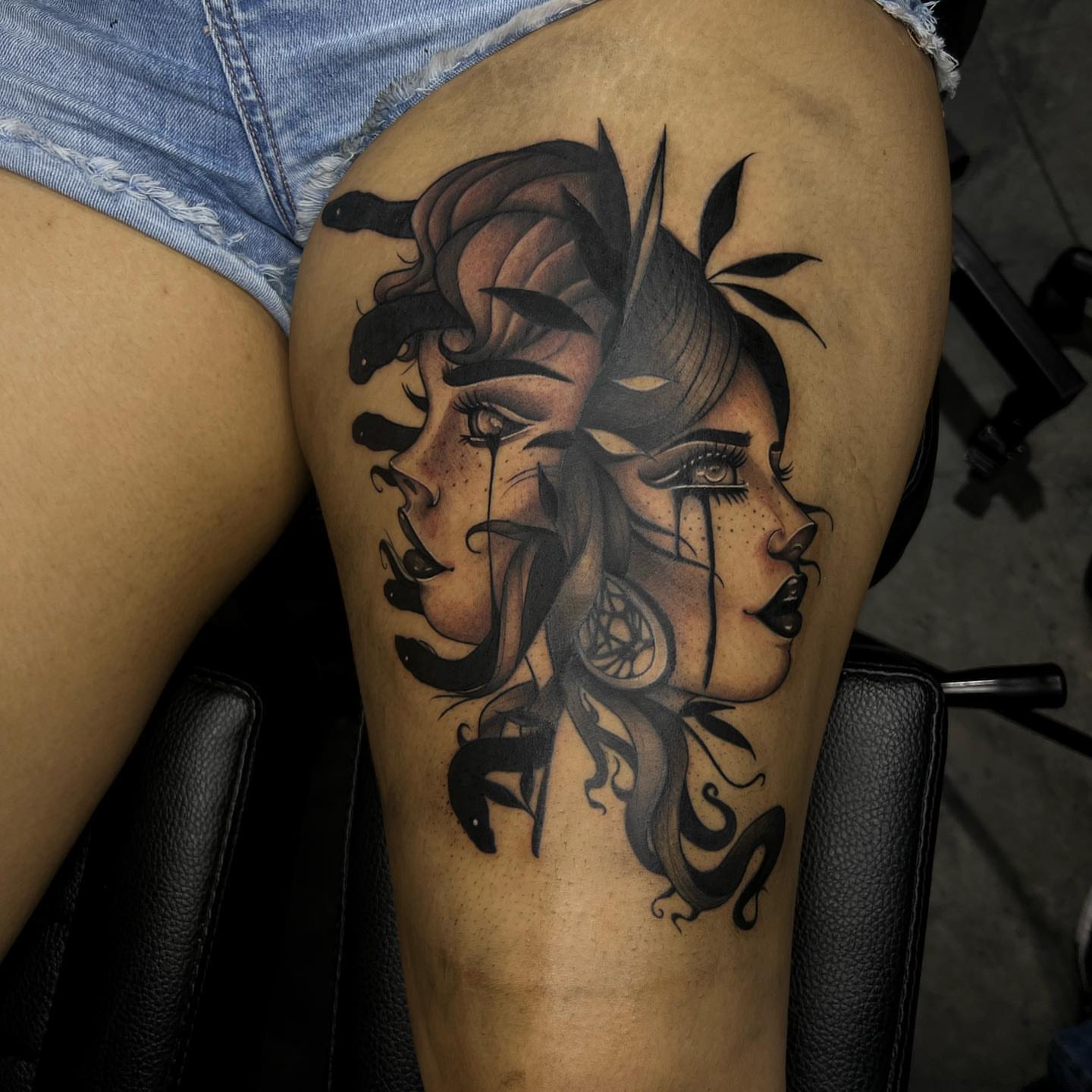 Woman's face realism tattoo on the thigh by Desirae✨