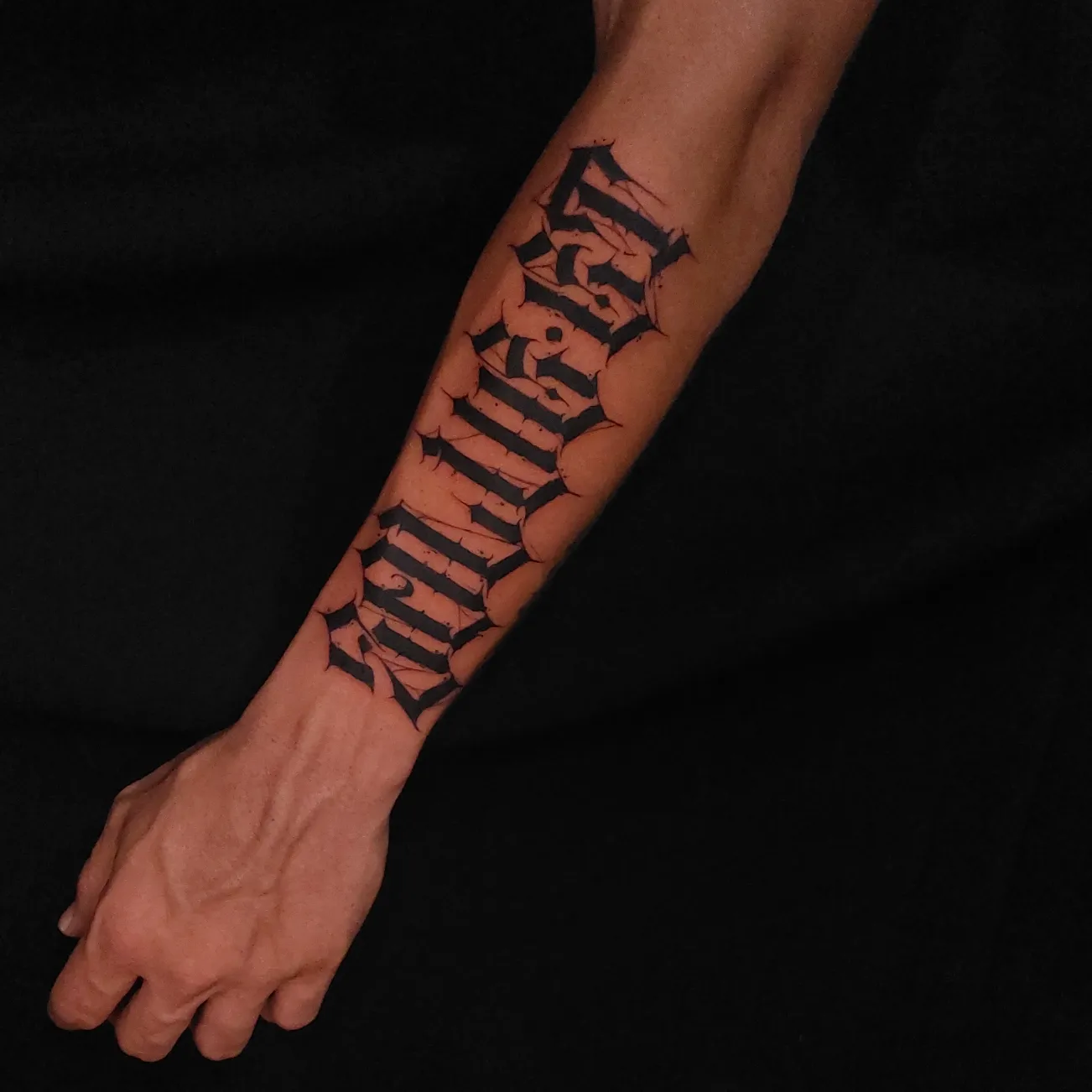 Gothic script lettering script tattoo on the forearm by Ceso732