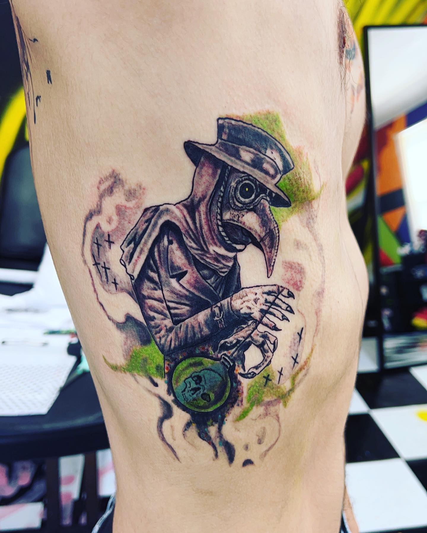 Plague doctor realism tattoo on the thigh by Dre Ortiz