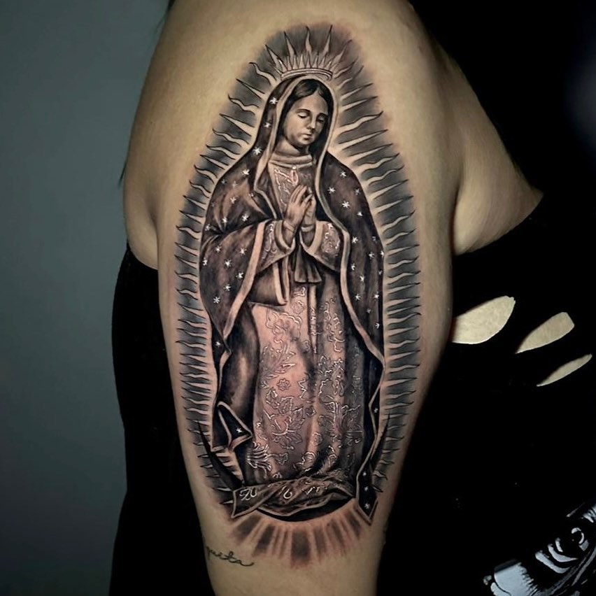 Our Lady of Guadalupe realism tattoo on the forearm by Elisha Kane
