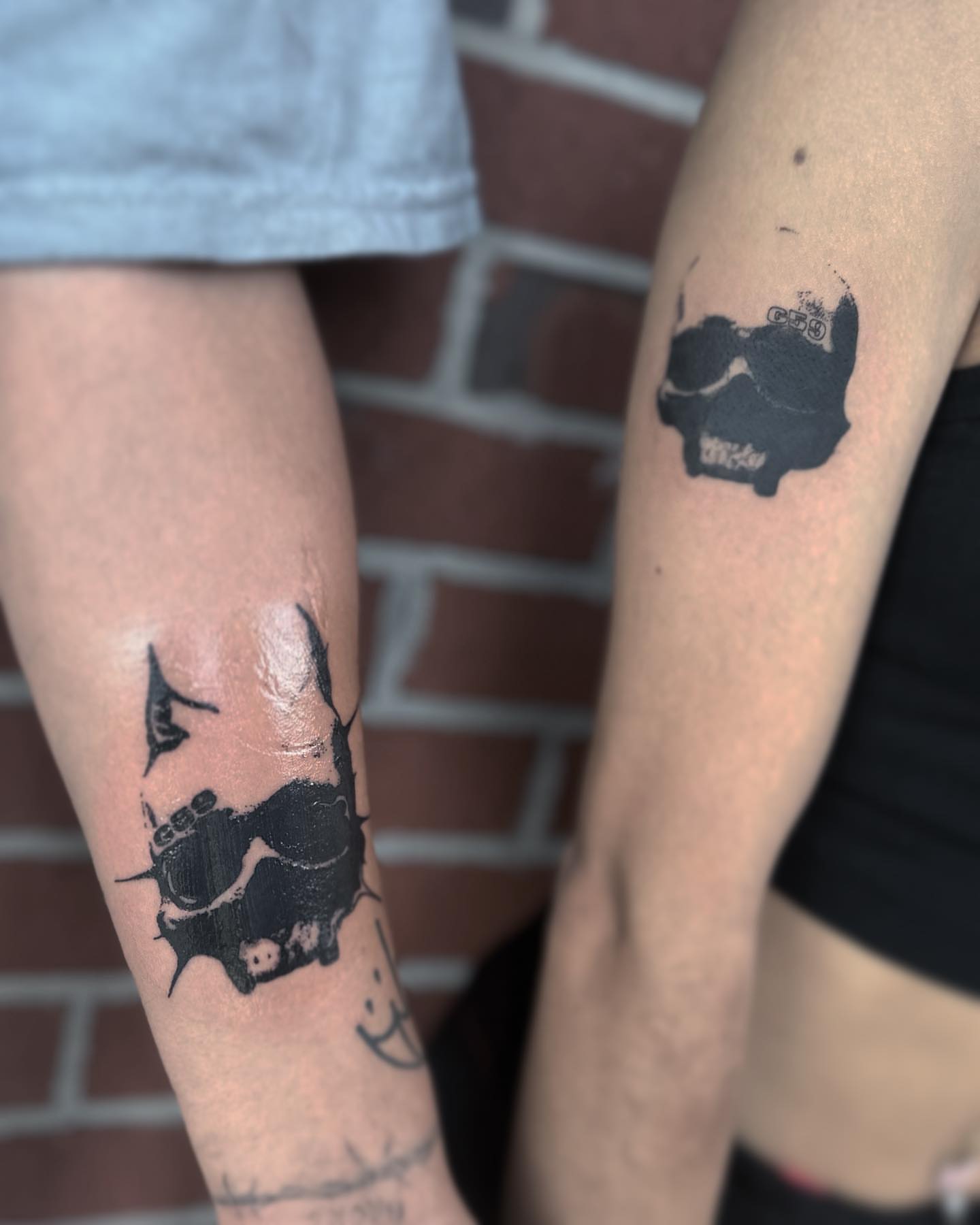 Bat black and grey tattoo on the forearm by Rachel Martinez