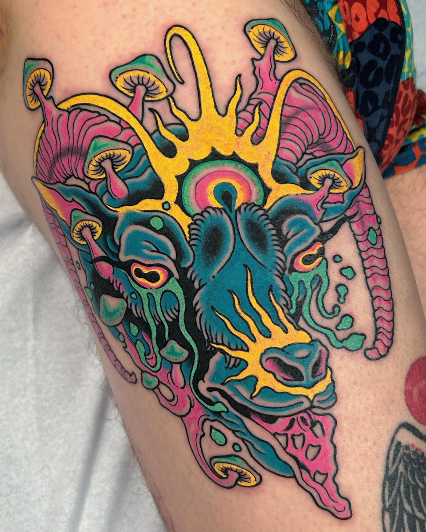 Psychedelic mushrooms new school tattoo on the thigh by Adam Mir