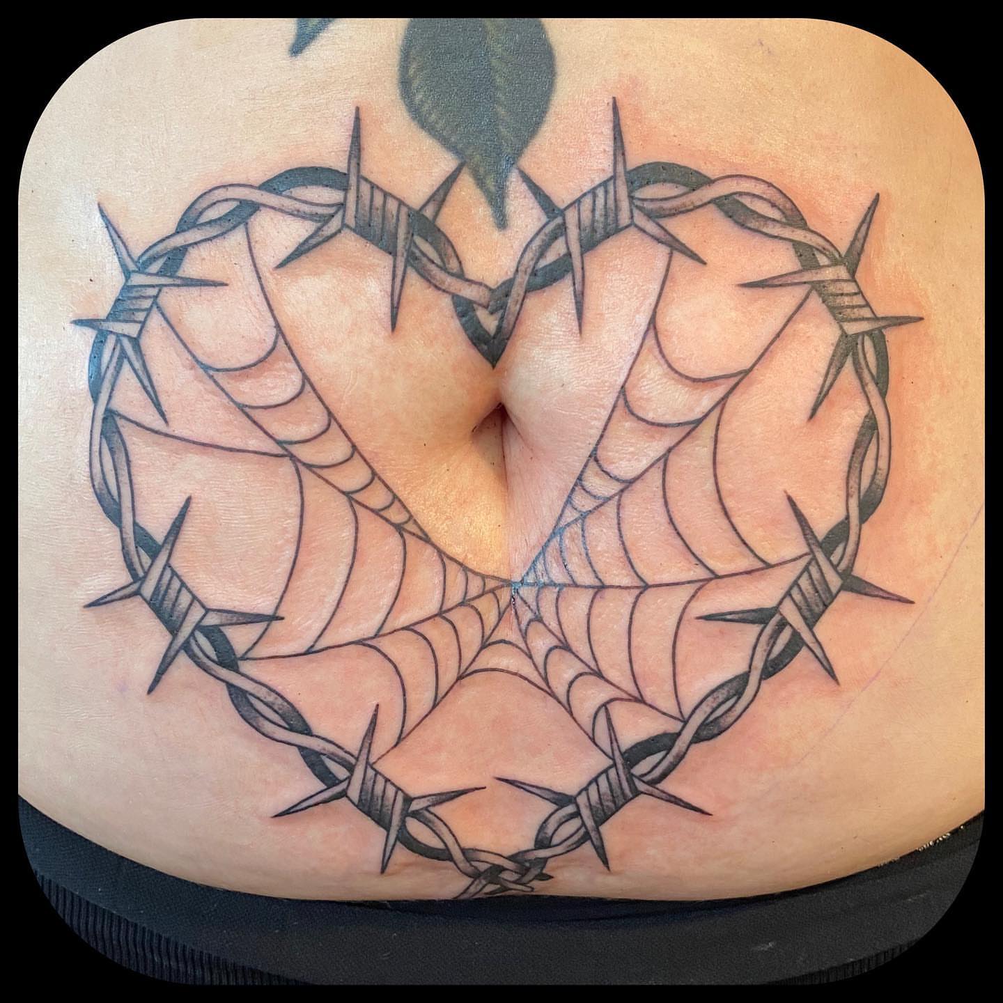 Barbed wire heart black and grey tattoo on the torso by ๐ญ๐๐ ๐ฎ๐๐๐๐๐, Berkeley, California
