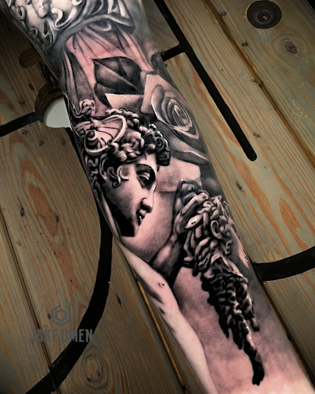 Tattoo by @jakeomen — black_and_grey, realism