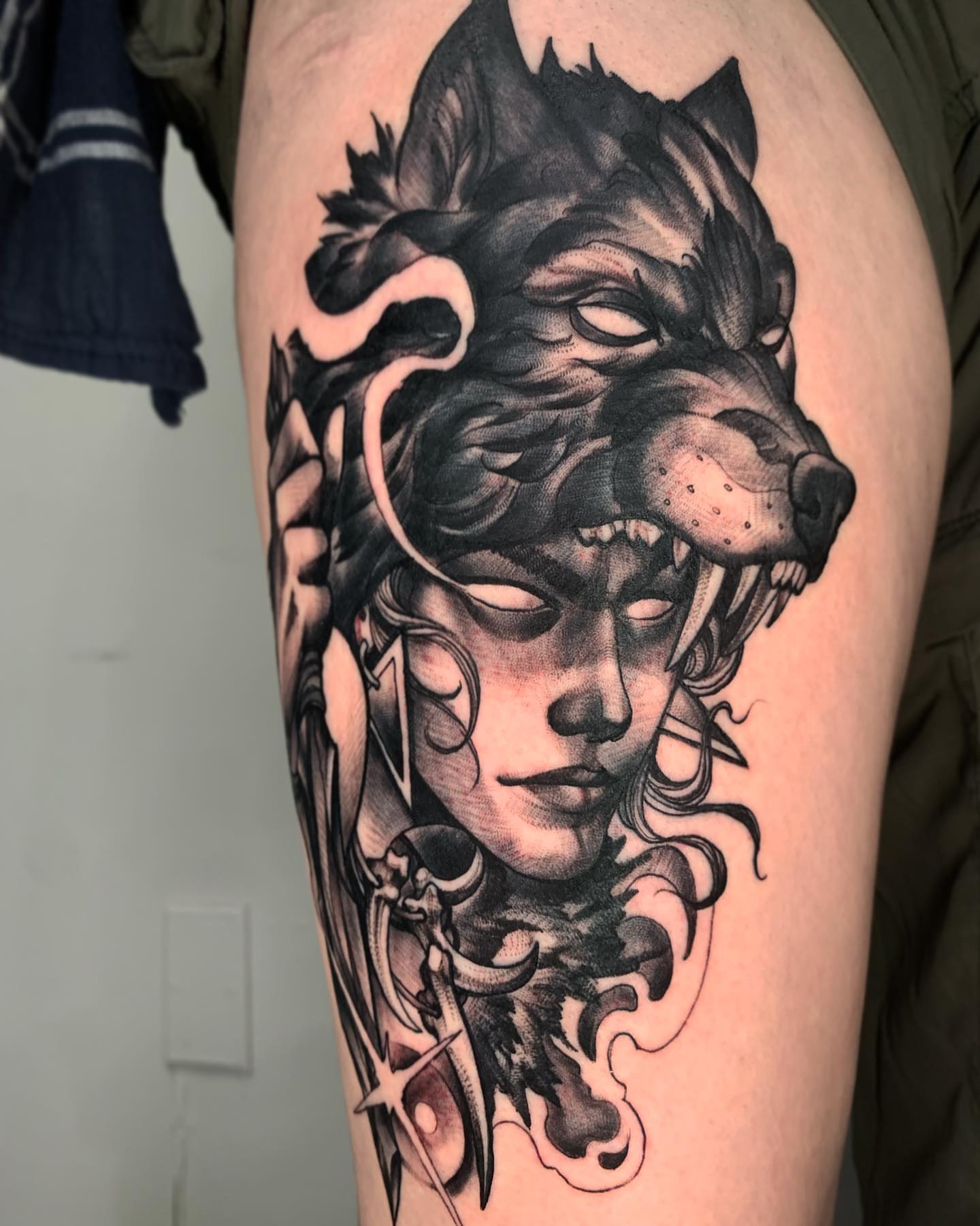Woman with wolf realism tattoo on the thigh by ⚔ Dylan Smith ⚔, Richmond, Virginia
