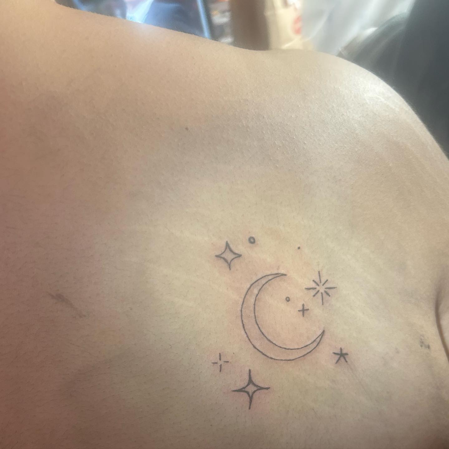Moon and stars minimalist tattoo on the back by ๐ฆ