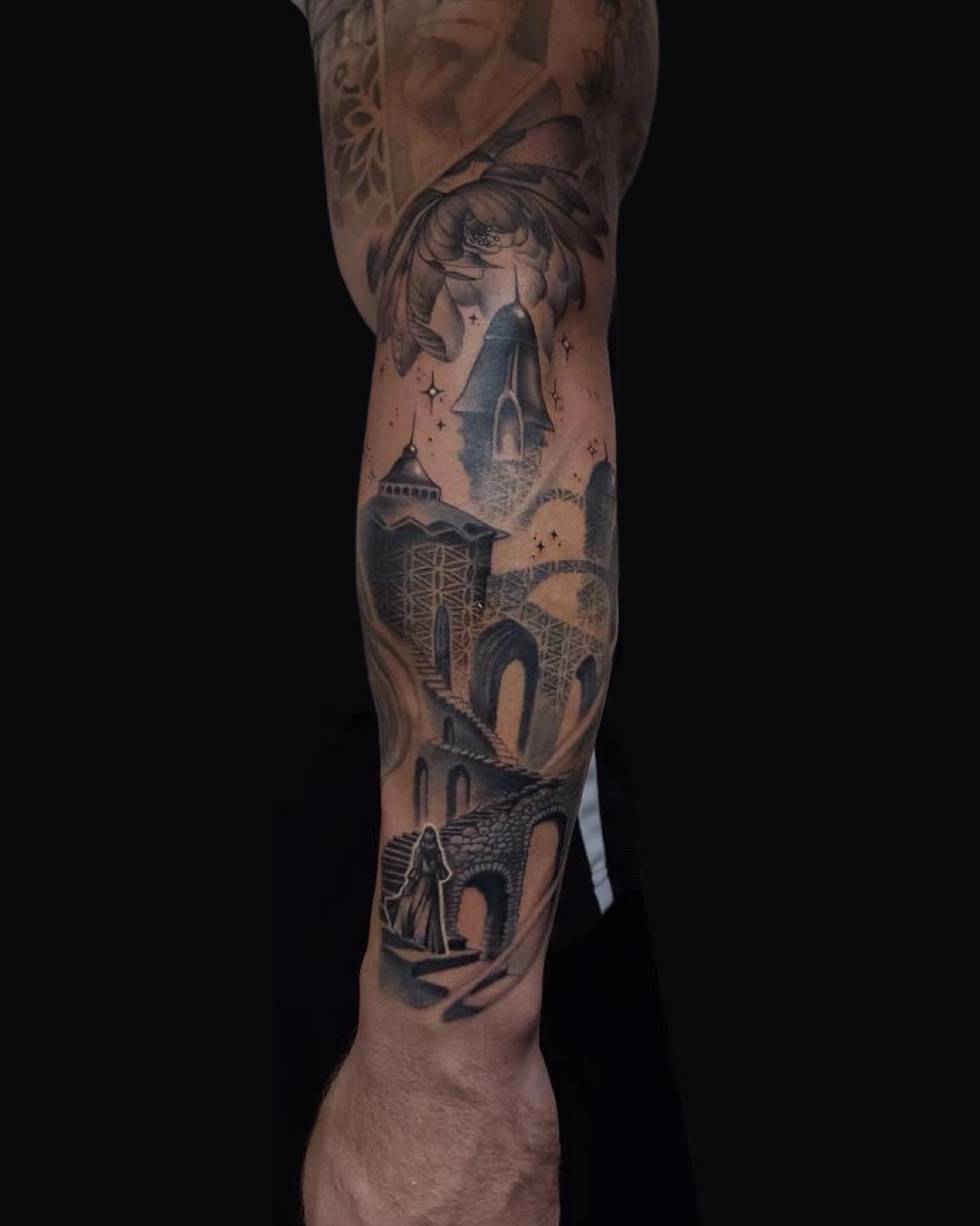 Castle ruins geometric tattoo on the forearm by Rain Delmar