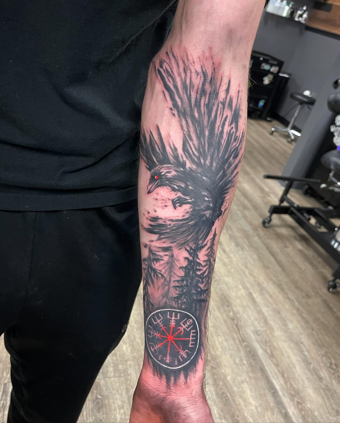 Crow realism tattoo on the forearm by Nate Masi