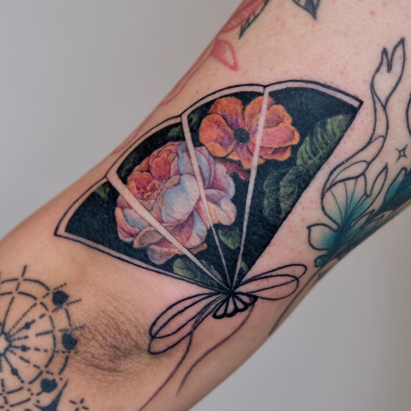 Flower bouquet new school tattoo on the forearm by Ka hiu chiu