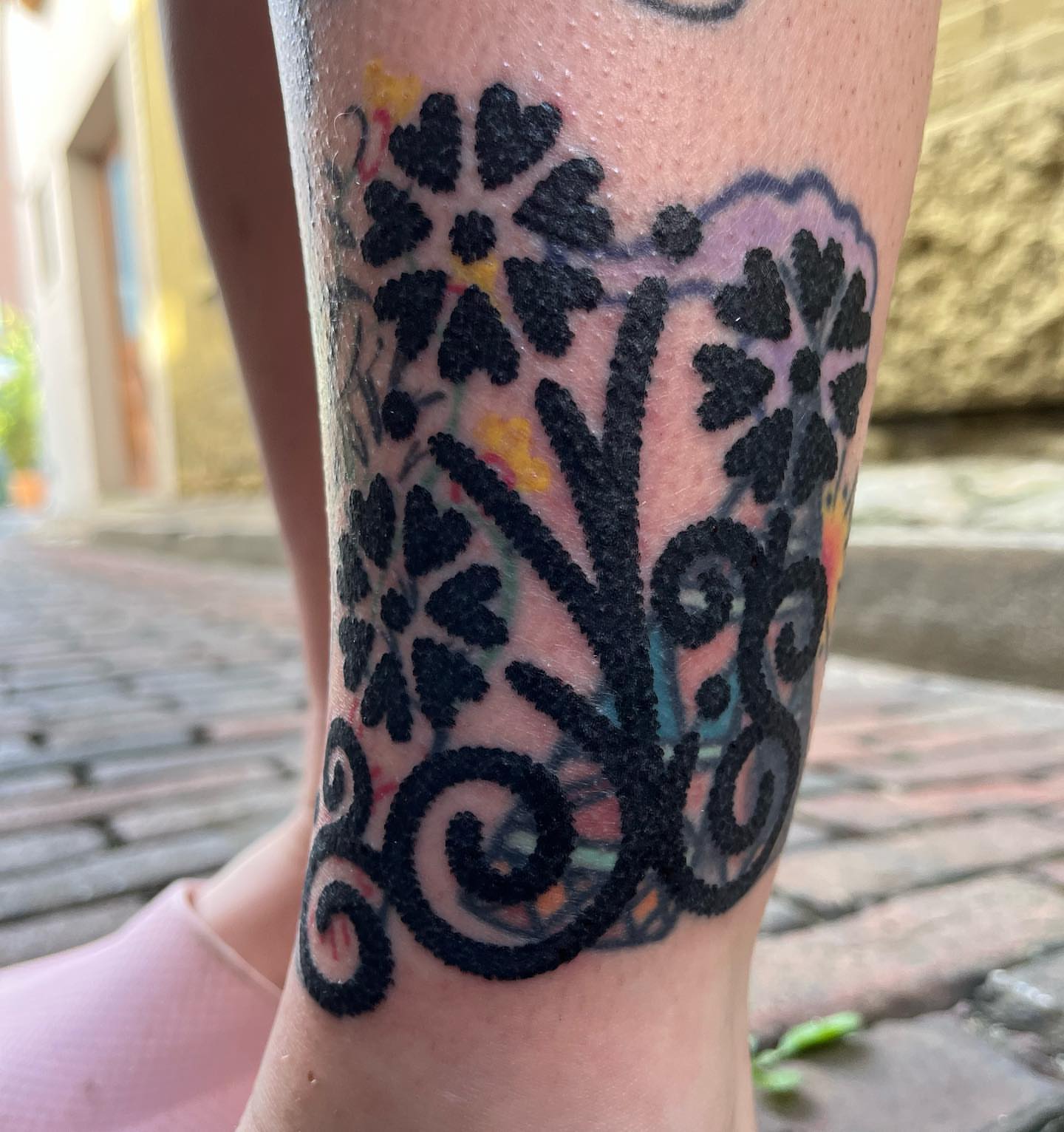 Abstract floral design dotwork tattoo on the calf by kevvy