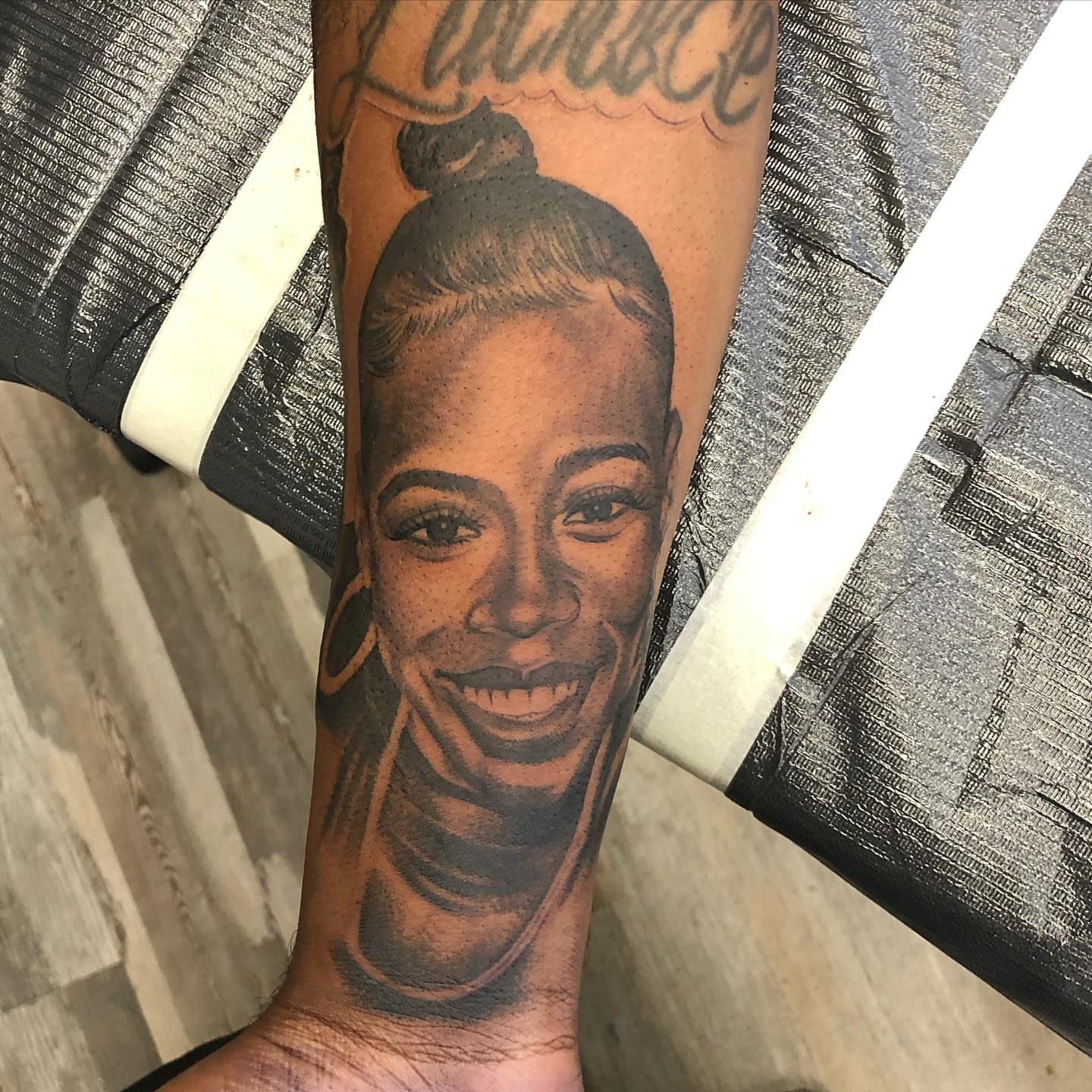 Portrait of a woman realism tattoo on the forearm by Living Life In The Gray Area