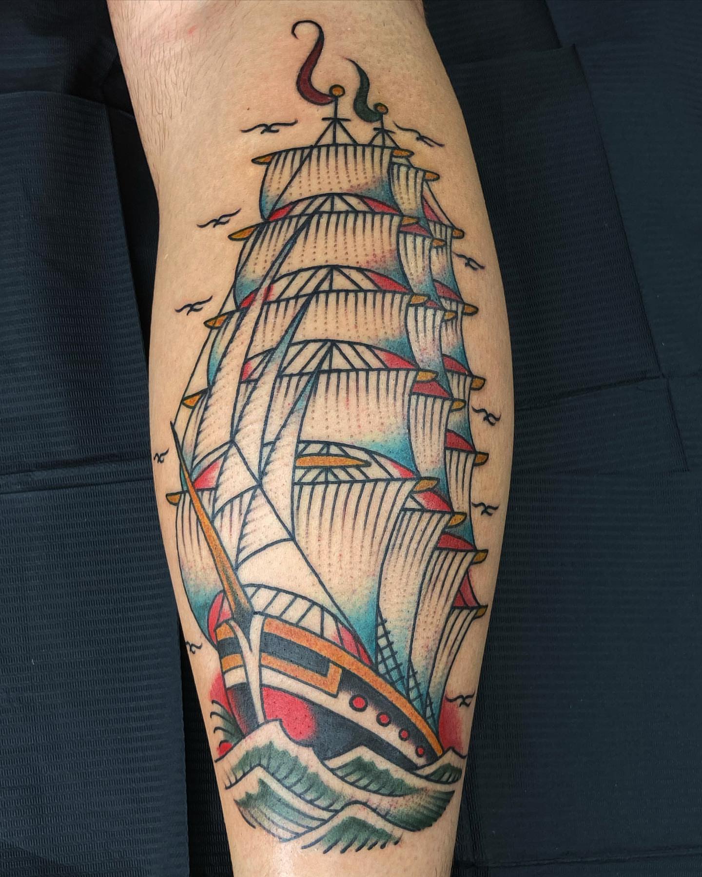 Sailboat American traditional tattoo on the forearm by Rob Banks