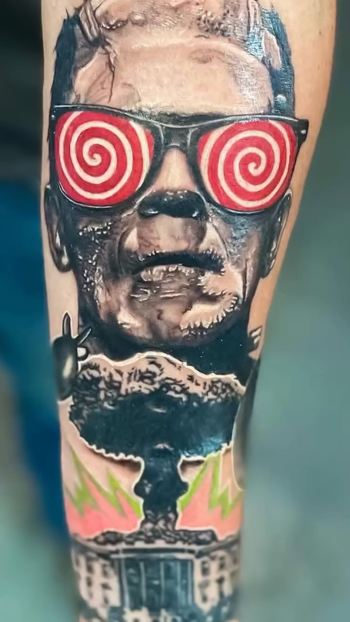 Frankenstein's monster and swirling glasses realism tattoo by Adrian Dominguez, Las Vegas, Nevada