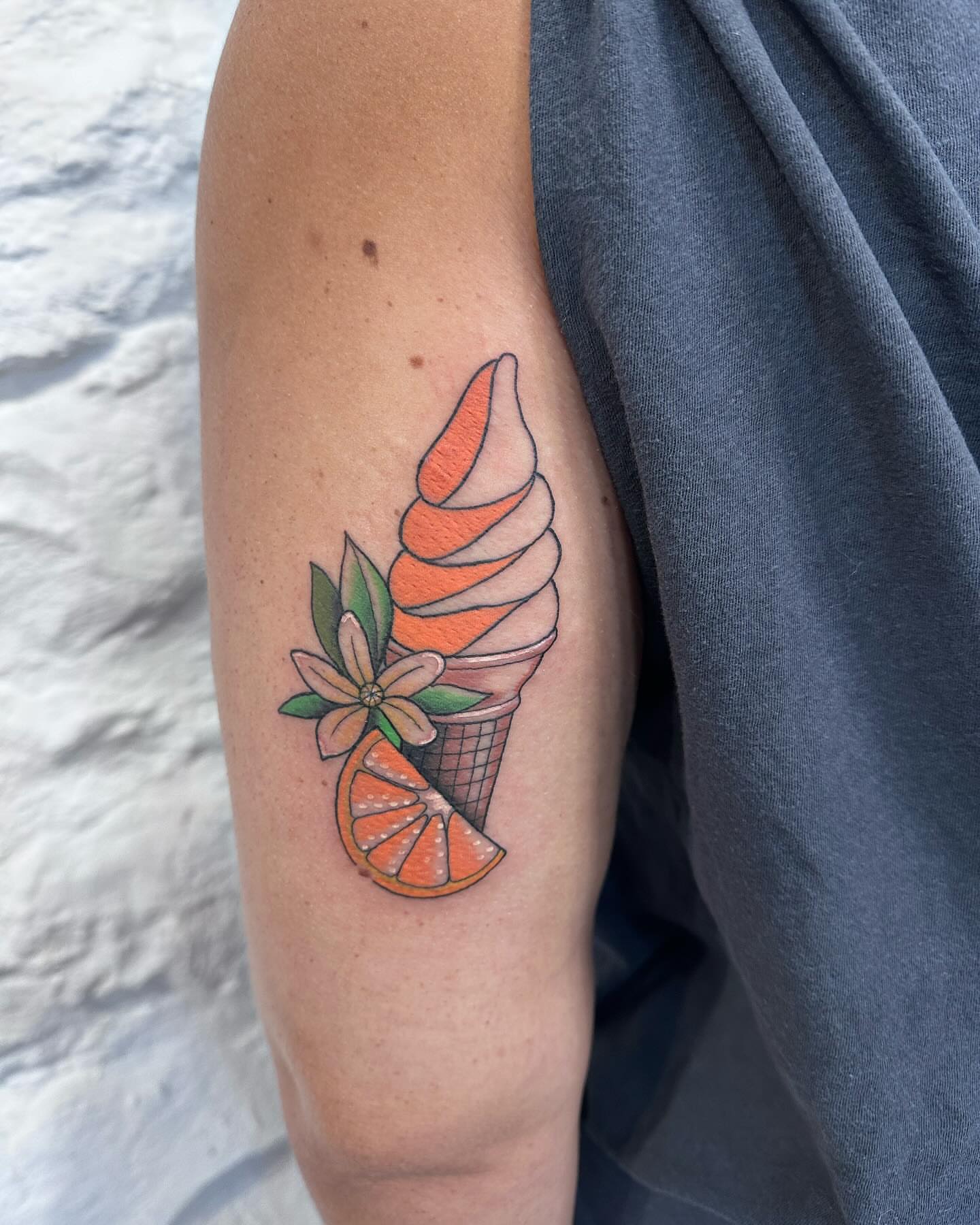 Ice cream cone new school tattoo on the forearm by Blake Owens, Nashville, Tennessee