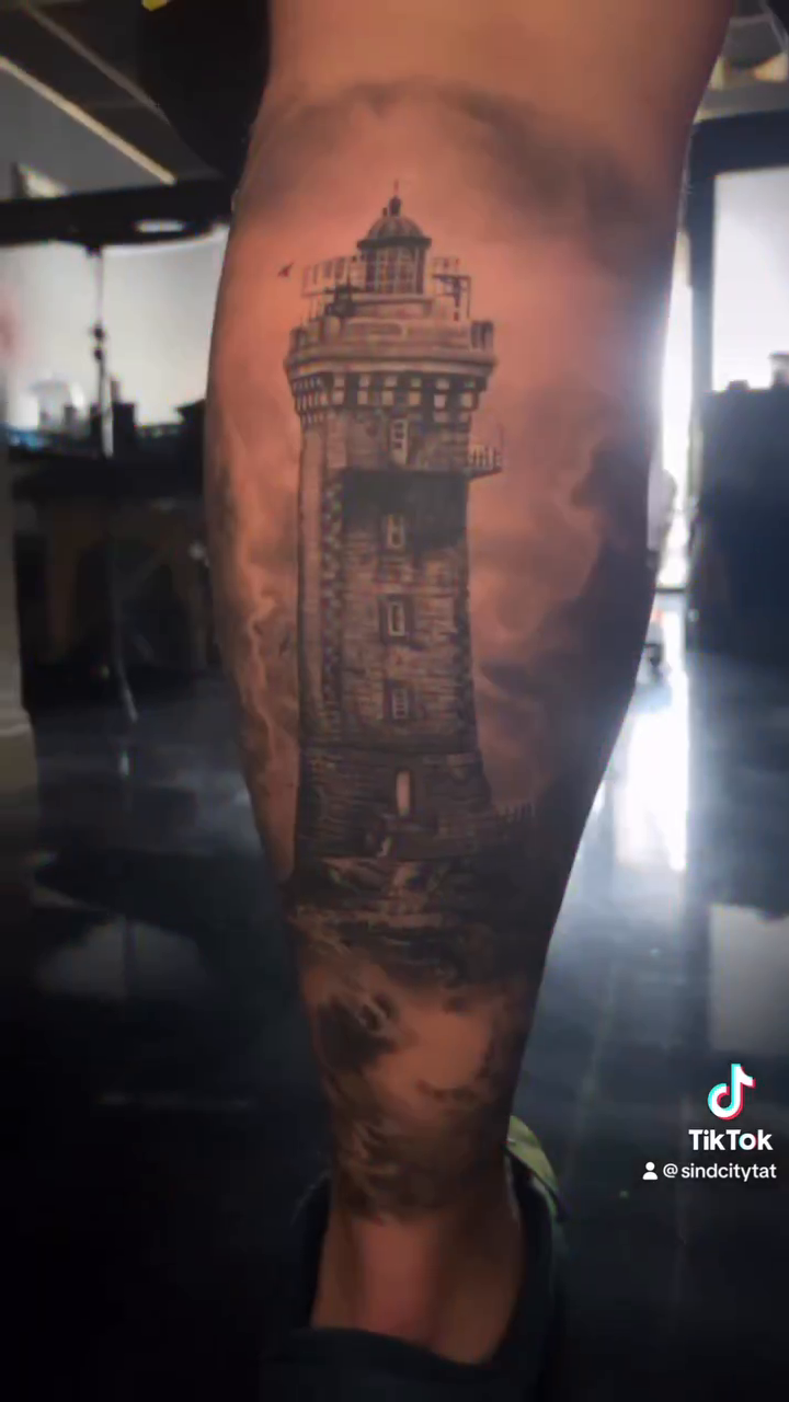 Lighthouse realism tattoo by Las Vegas Tattoo Artist