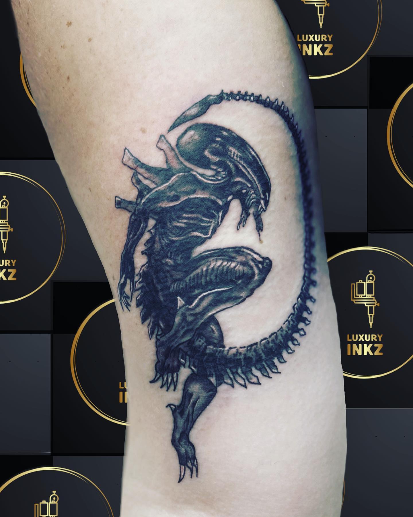 Alien creature realism tattoo on the forearm by Shake_tatts