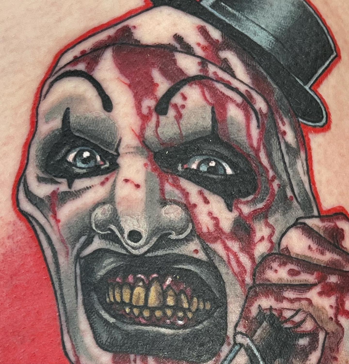 Clown American traditional tattoo on the head by Walter Frank