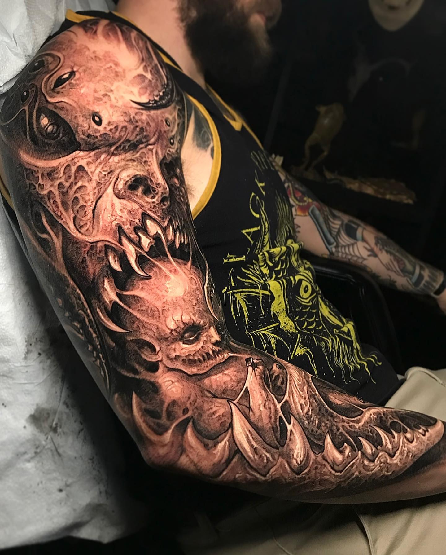 Demon dark realism tattoo on the forearm by Brandon Herrera
