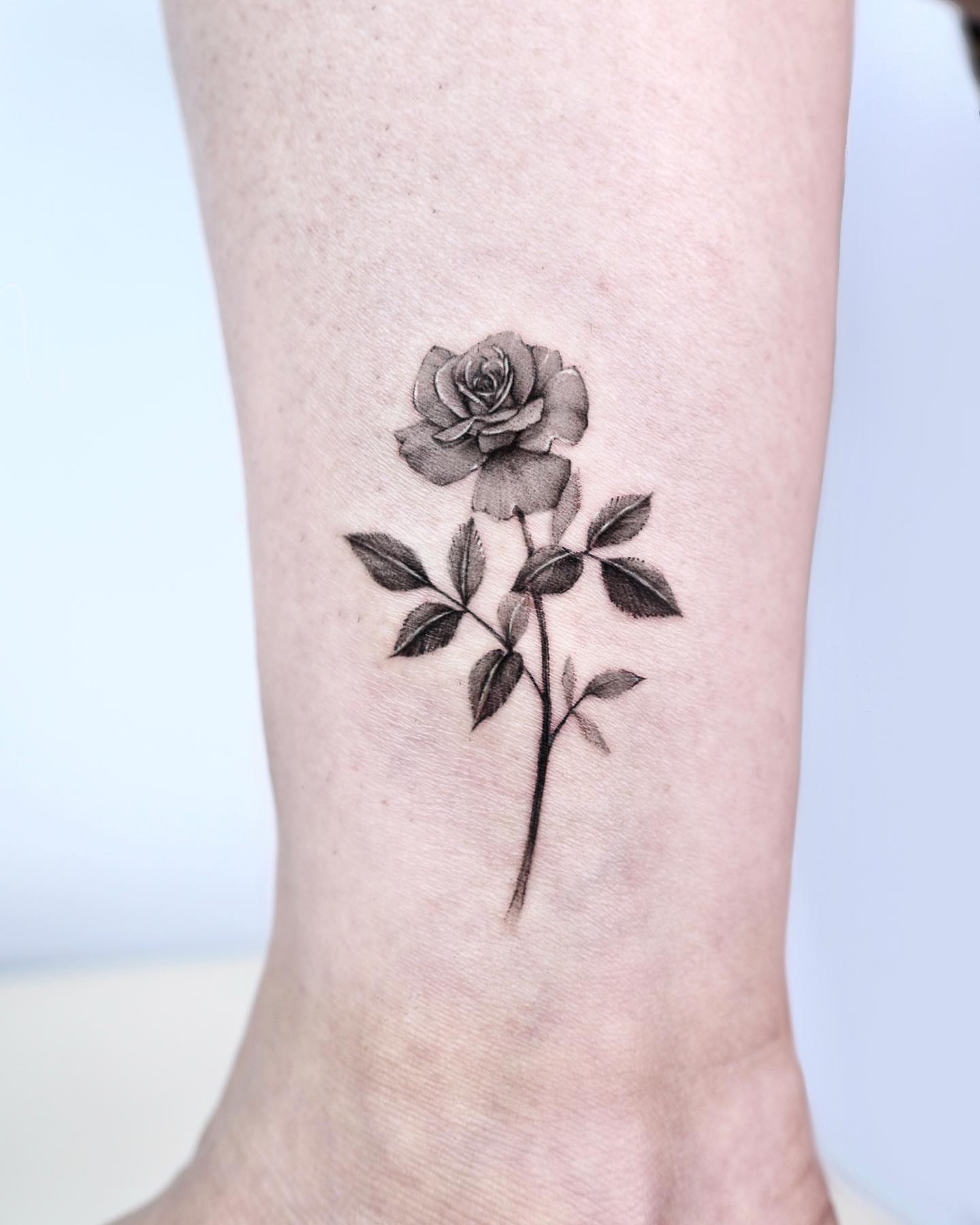 Tattoo by @xrou_tattoo — black_and_grey