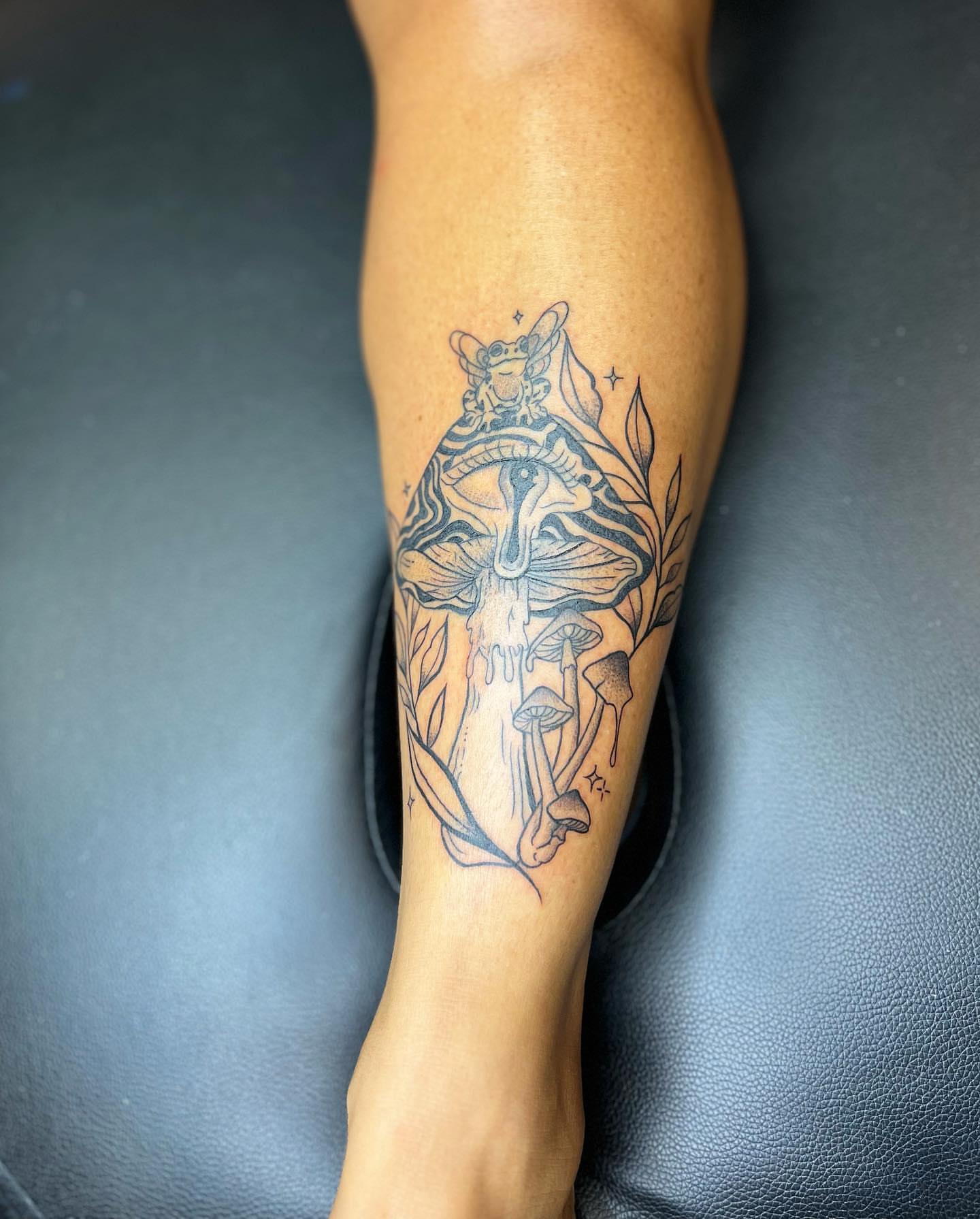 Eye and mushrooms geometric tattoo on the forearm by ✨BADJASS the tattoo artist✨