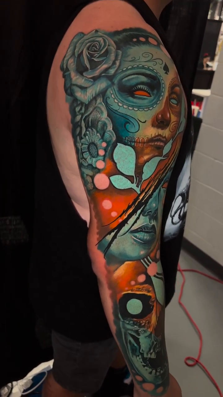 Day of the Dead inspired sleeve neo-traditional tattoo by Joseph Delaparra