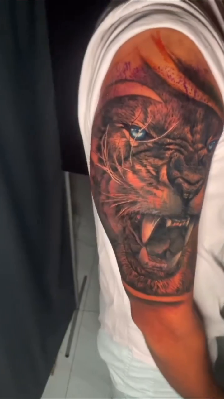 Tiger head realism tattoo by ππ§π