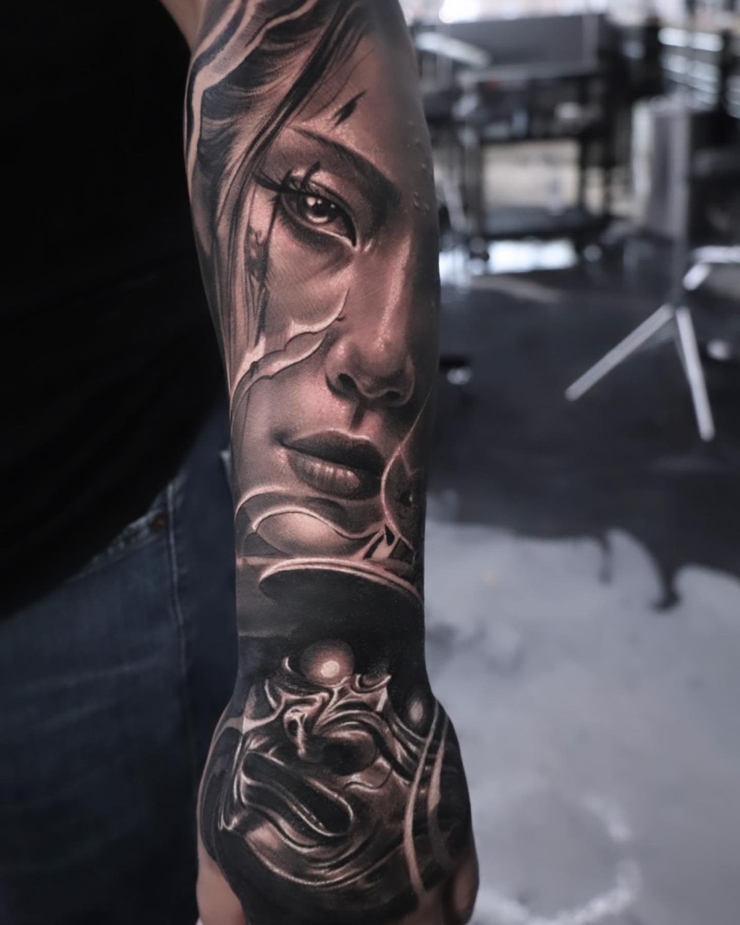 Woman's face realism tattoo on the forearm by Tattoos By Chino