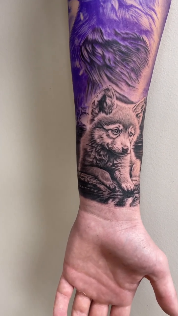Wolf cub and mother wolf realism tattoo by Charlie
