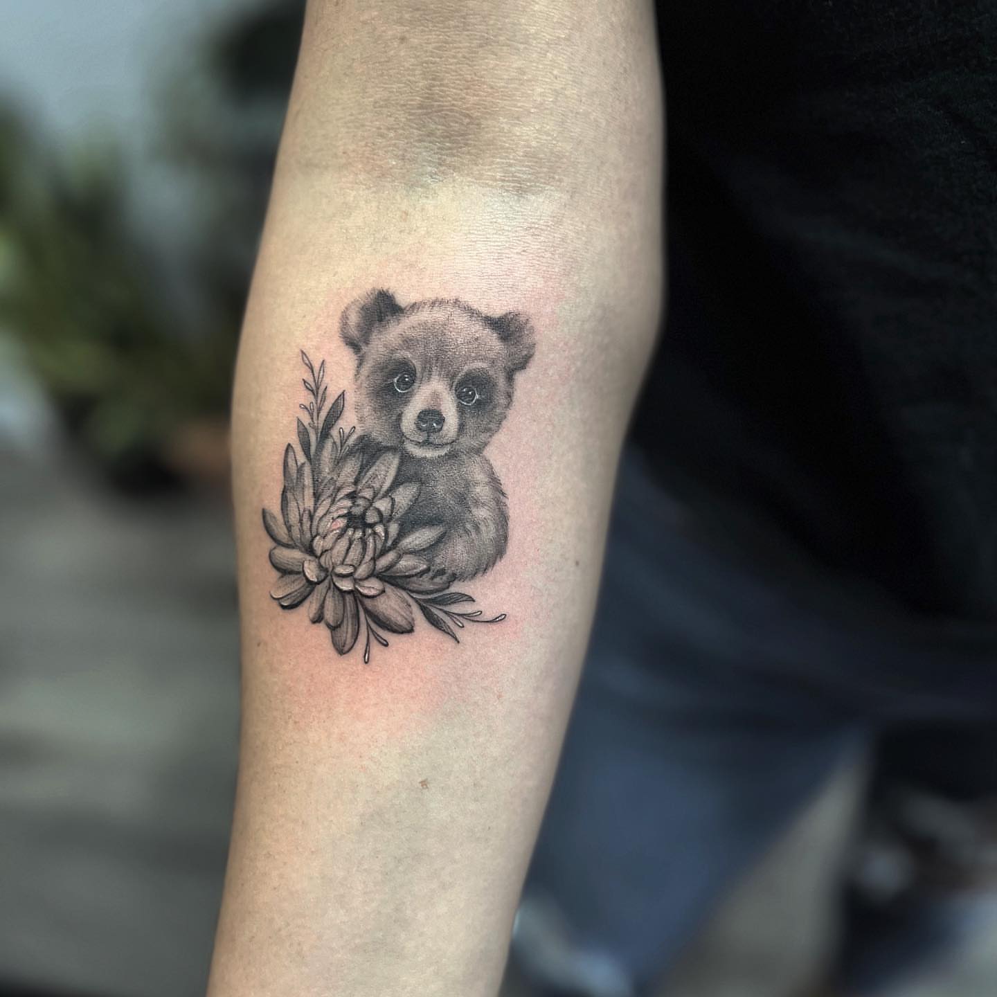 Bear cub black and grey tattoo on the forearm by Nance⚡