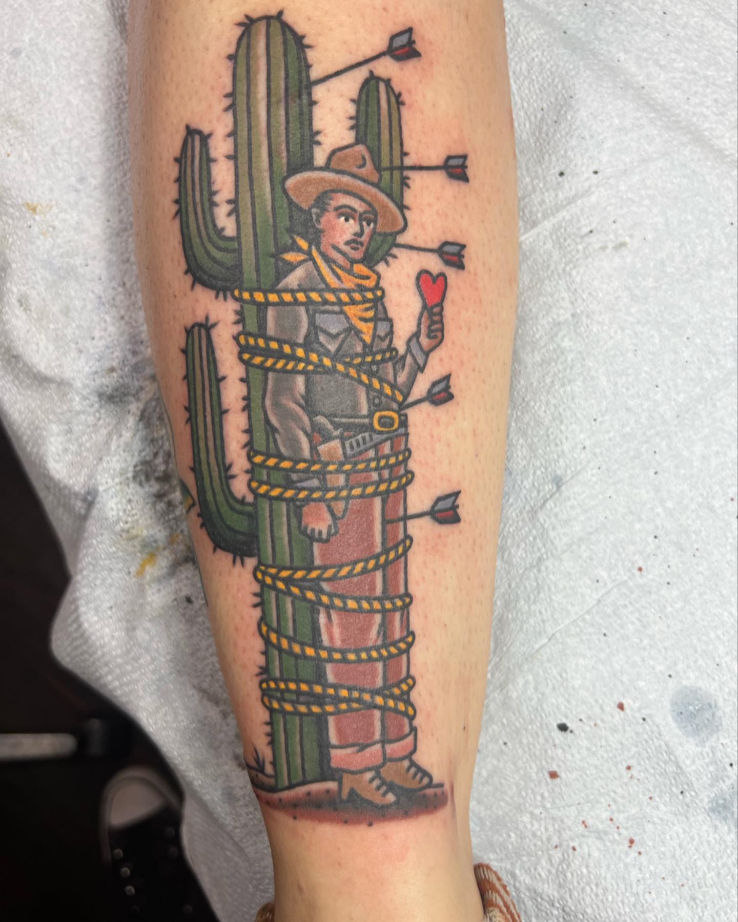 Cowboy with cactus American traditional tattoo on the forearm by Ross K. Jones Tattoos, San Francisco, California