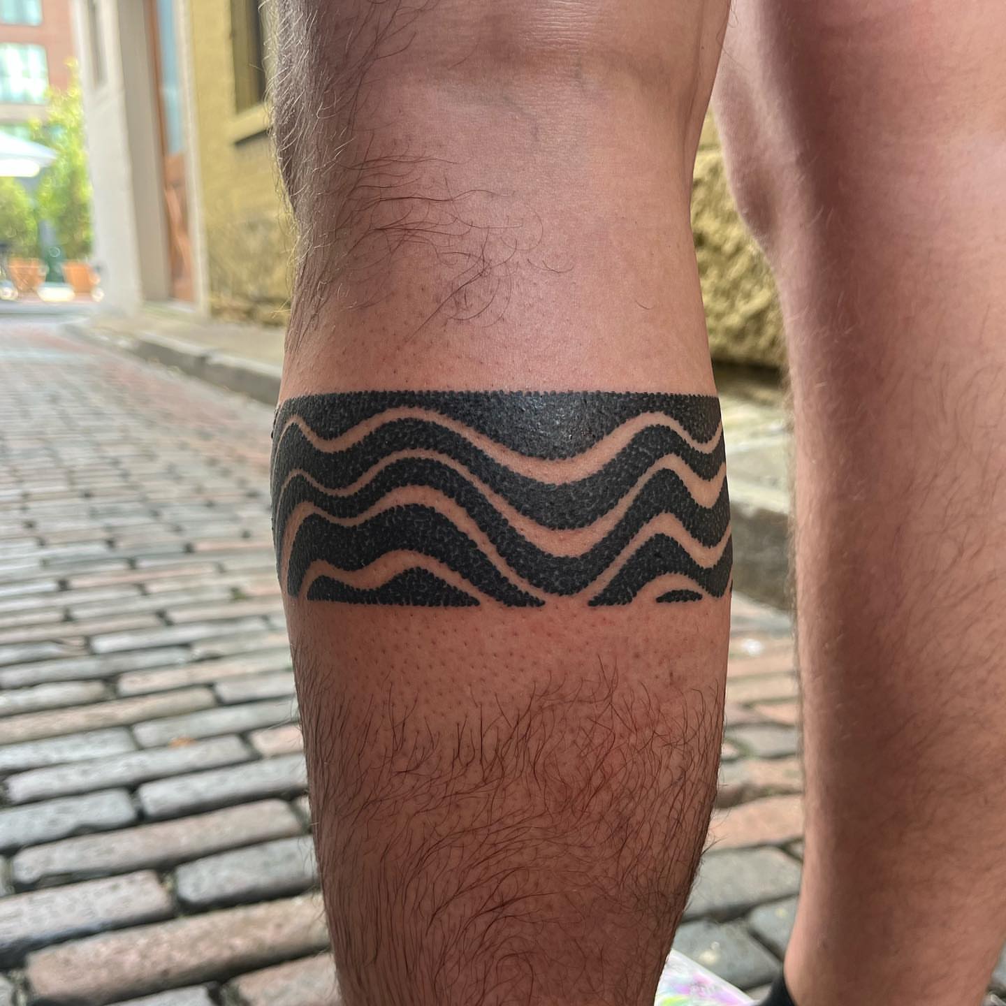 Waves dotwork tattoo on the forearm by kevvy