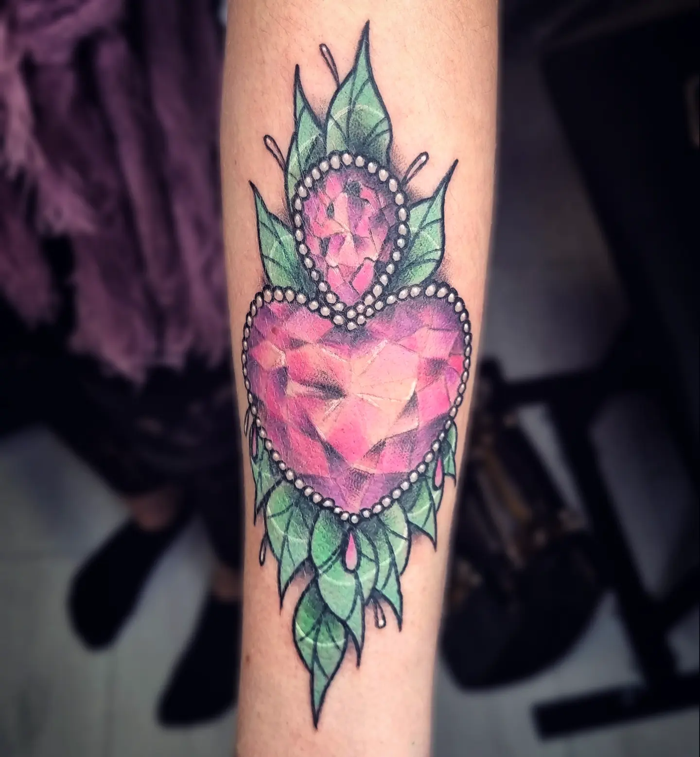 Gemstone heart new school tattoo on the forearm by AntiheroTattoo
