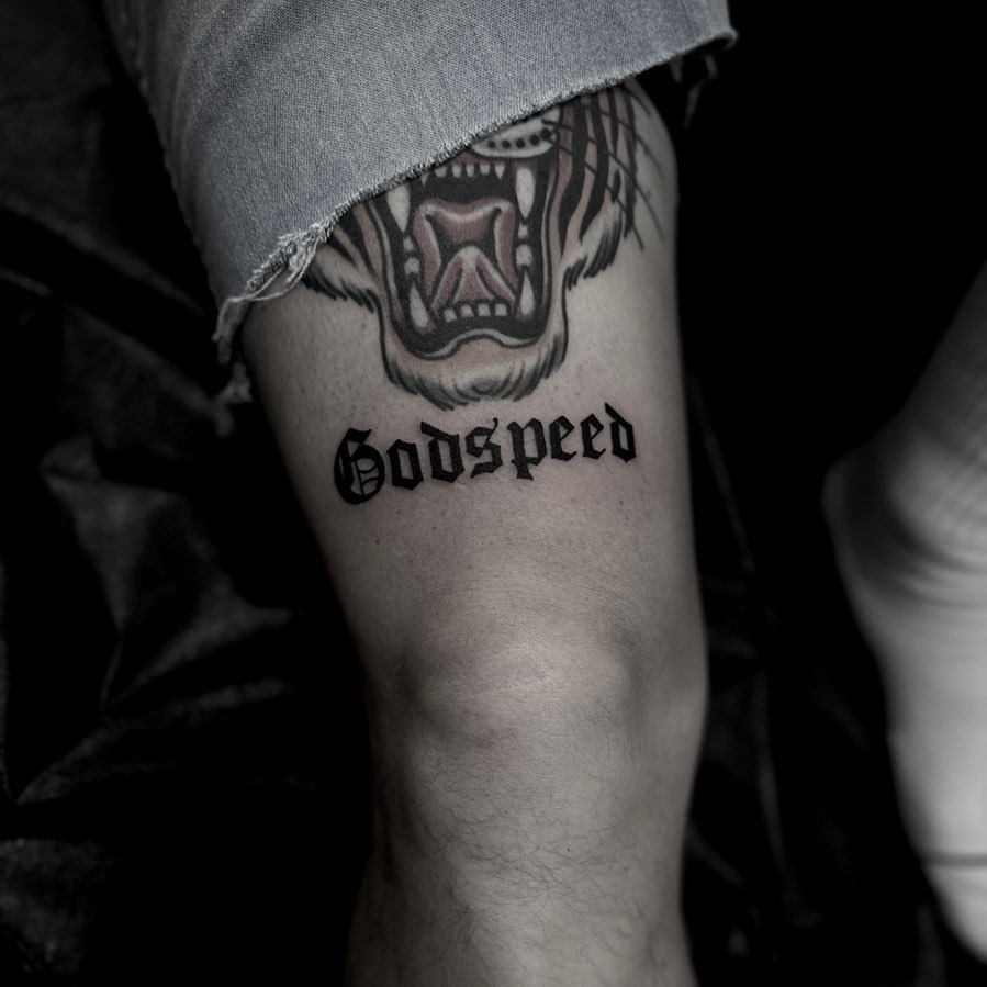 Roaring tiger black and grey tattoo on the forearm by t a y l o r