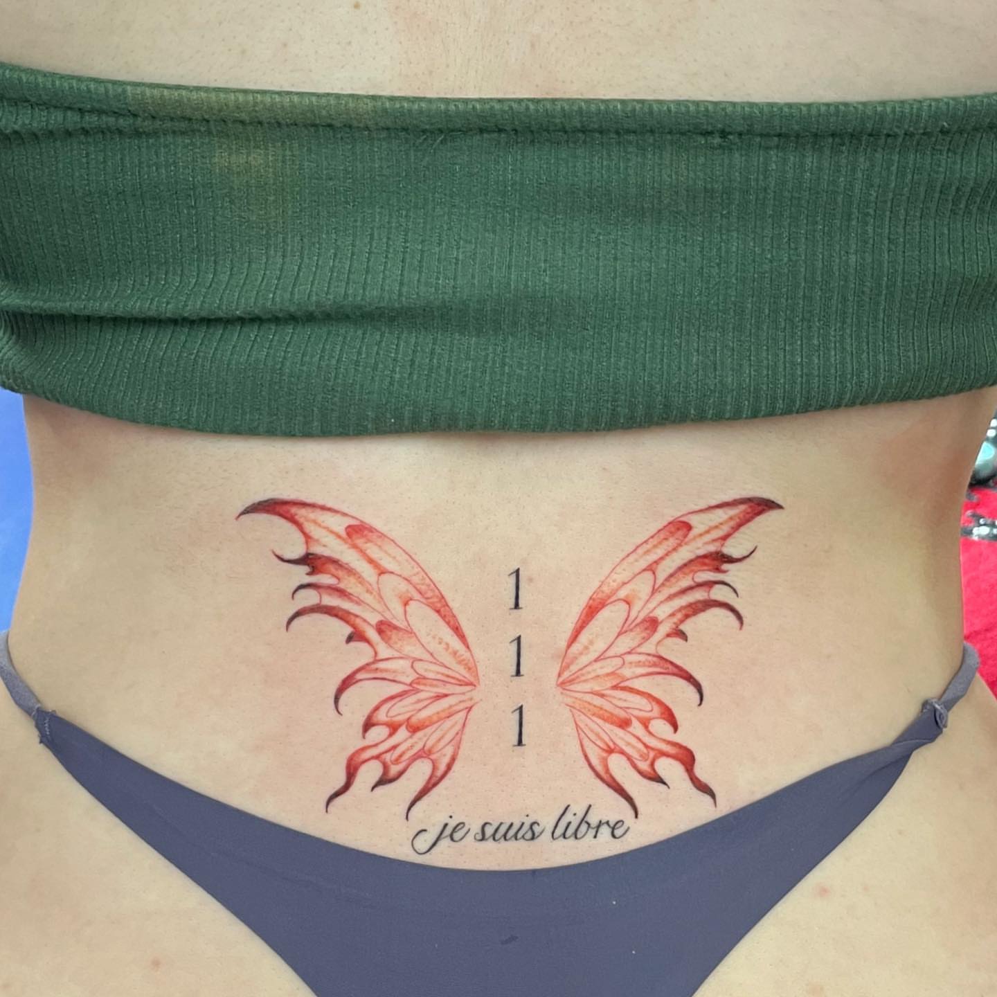 Wings neo-traditional tattoo on the torso by Manny