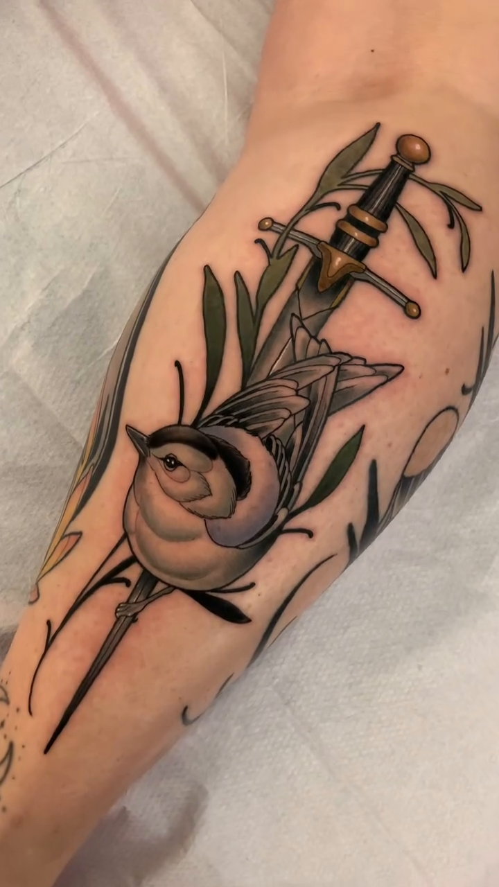 Sword and bird realism tattoo by Luis Torres, Harrison, New Jersey