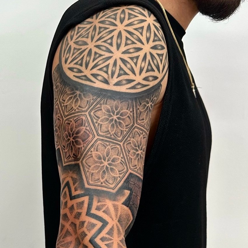 Tattoo by @romanostattoo — dotwork, geometric