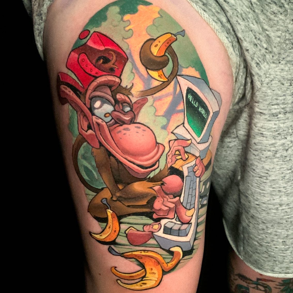 Monkey with bananas illustrative tattoo on the forearm by Joshua L Wilson, Dayton, Ohio