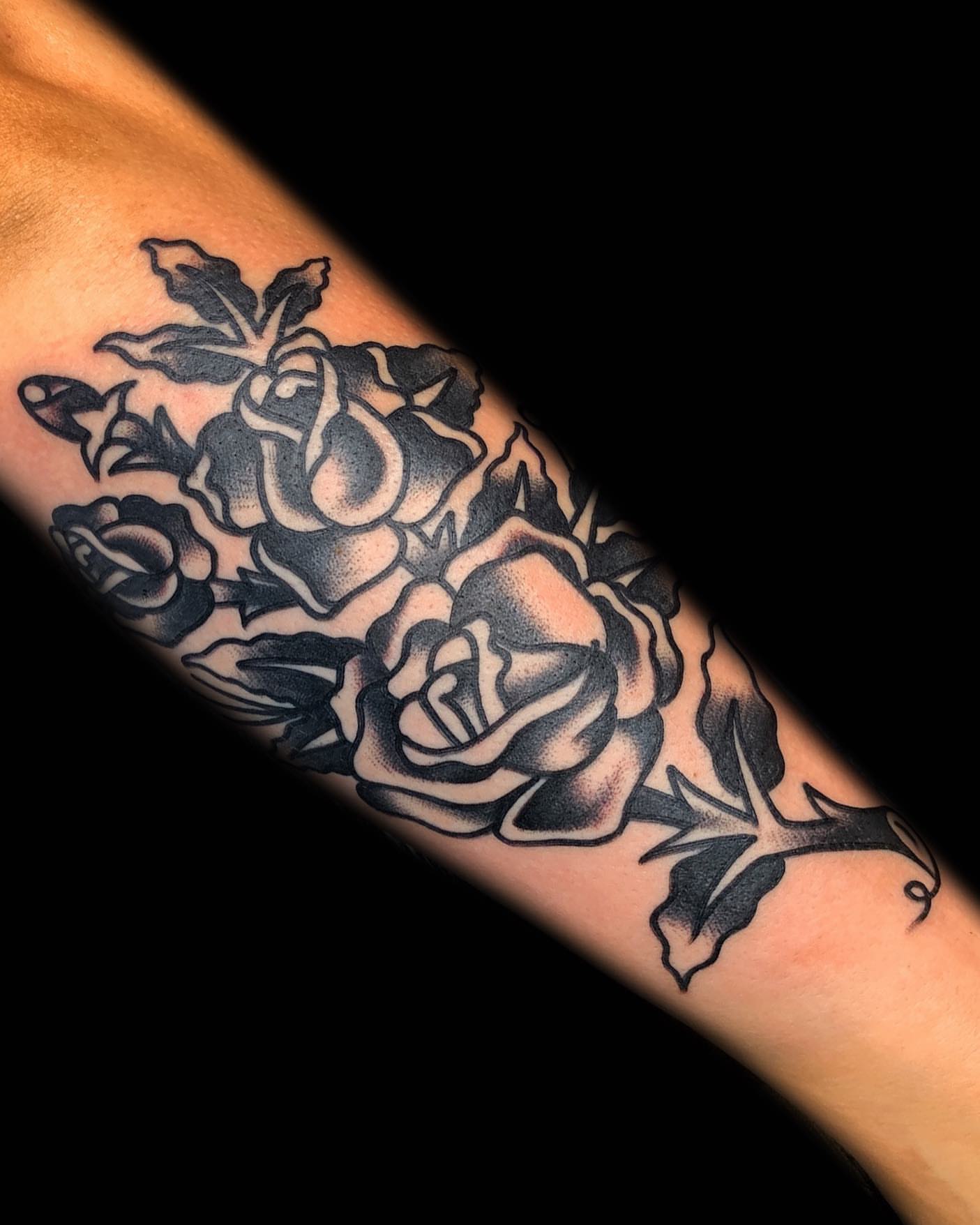 Roses American traditional tattoo on the forearm by The Calamari Kid