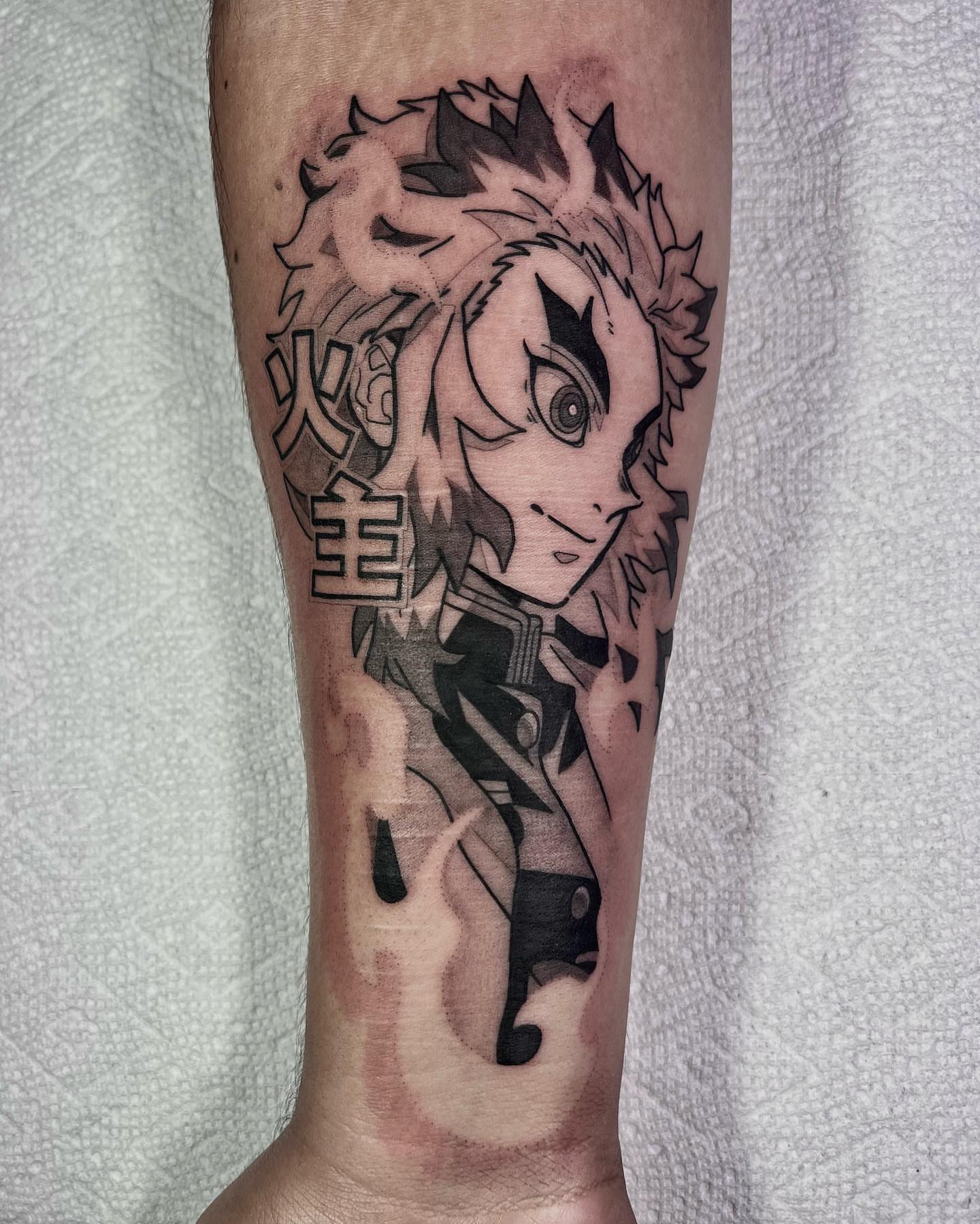 Anime character anime tattoo on the forearm by Chandler Roe