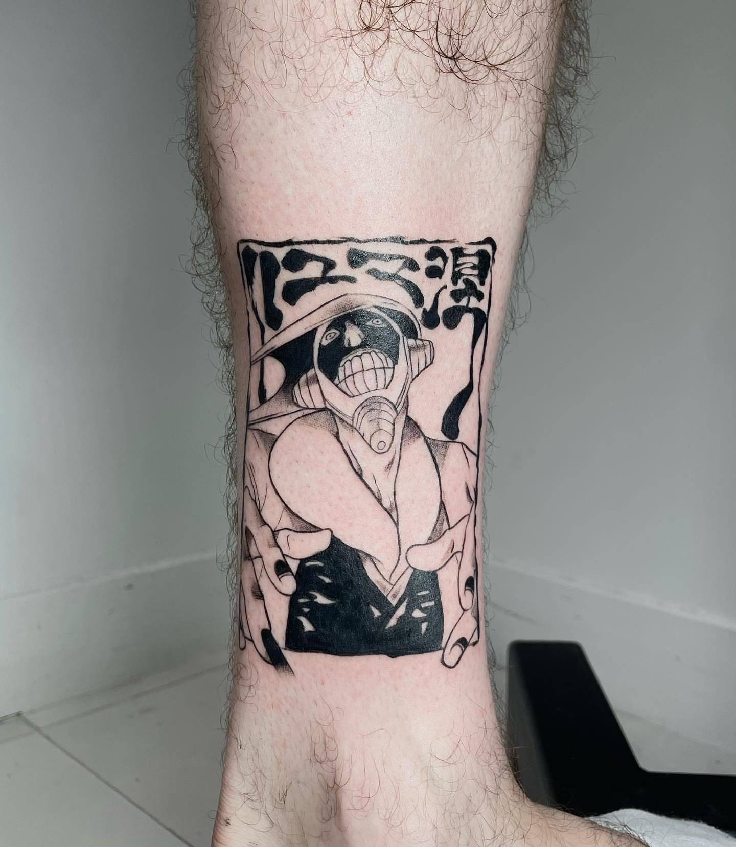 Skull with gas mask black and grey tattoo on the forearm by Abrianna