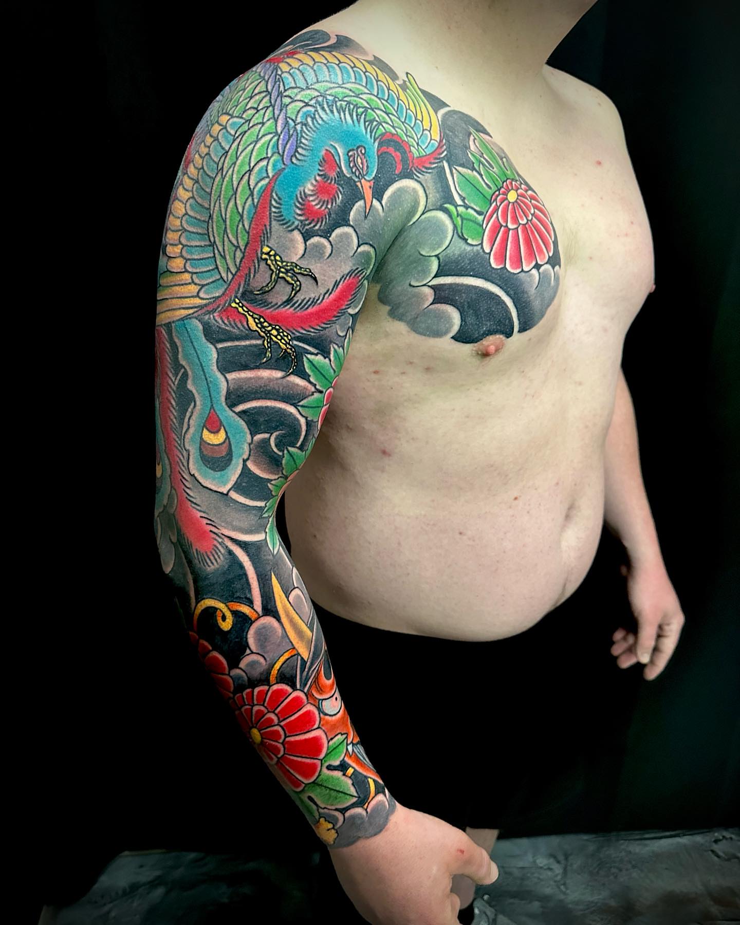 Peacock and floral japanese irezumi tattoo on the shoulder by Marcos Rivera, Laredo, Texas