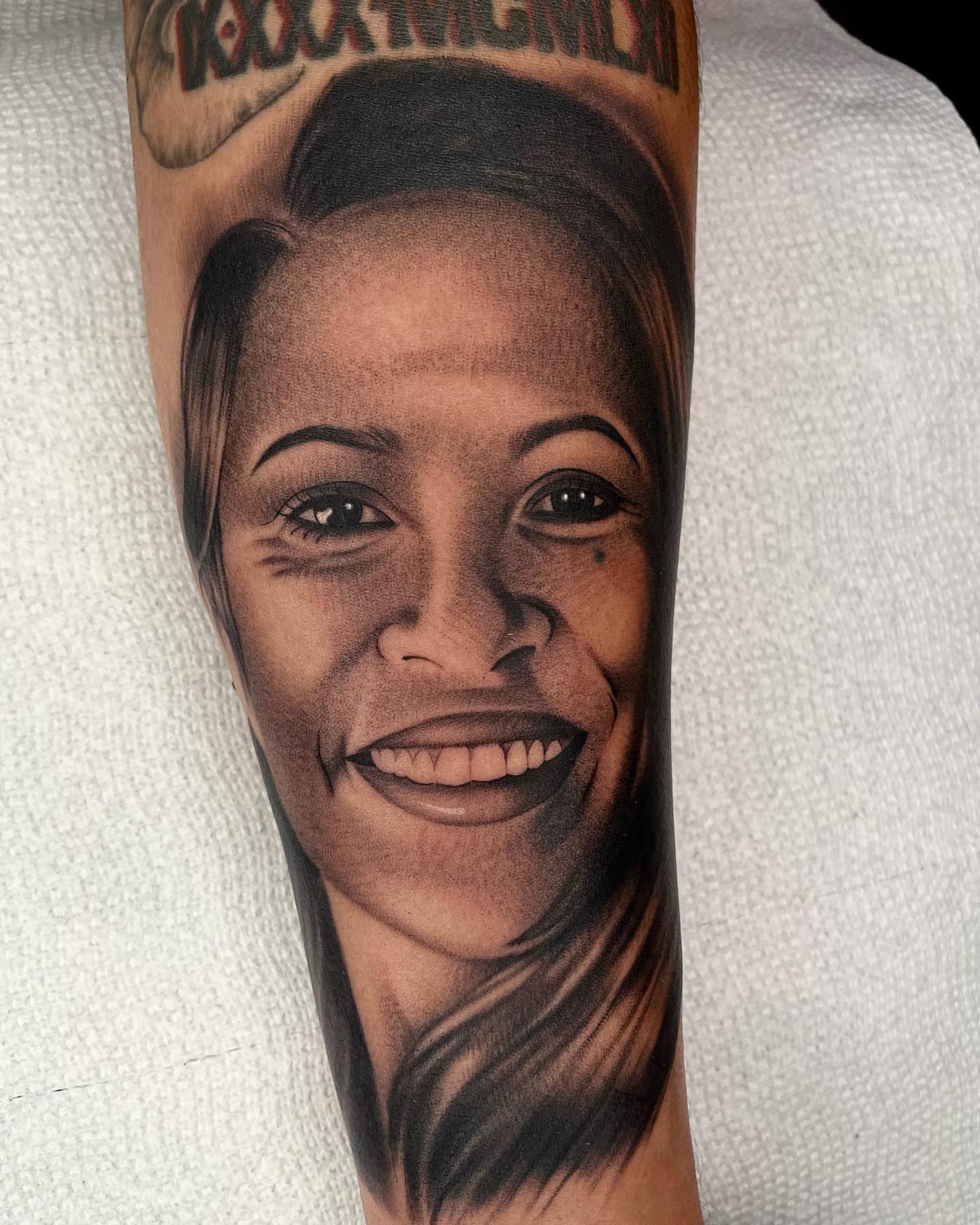Portrait realism tattoo on the forearm by 𝖃𝖆𝖛𝖎𝖊𝖗 𝕬. 𝕾𝖆𝖑𝖎𝖓𝖆𝖘