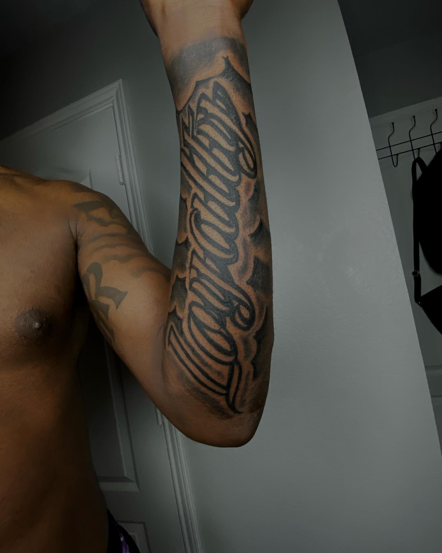 Script lettering lettering script tattoo on the forearm by dallas tattoo artist, Duncanville, Texas