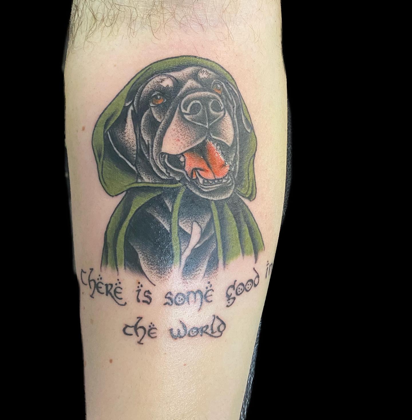 Dog with hood dotwork tattoo on the forearm by Shelby Warren